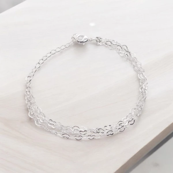Pulseira Tripla Corações