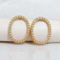 Brinco Oval Vazado Zirconia